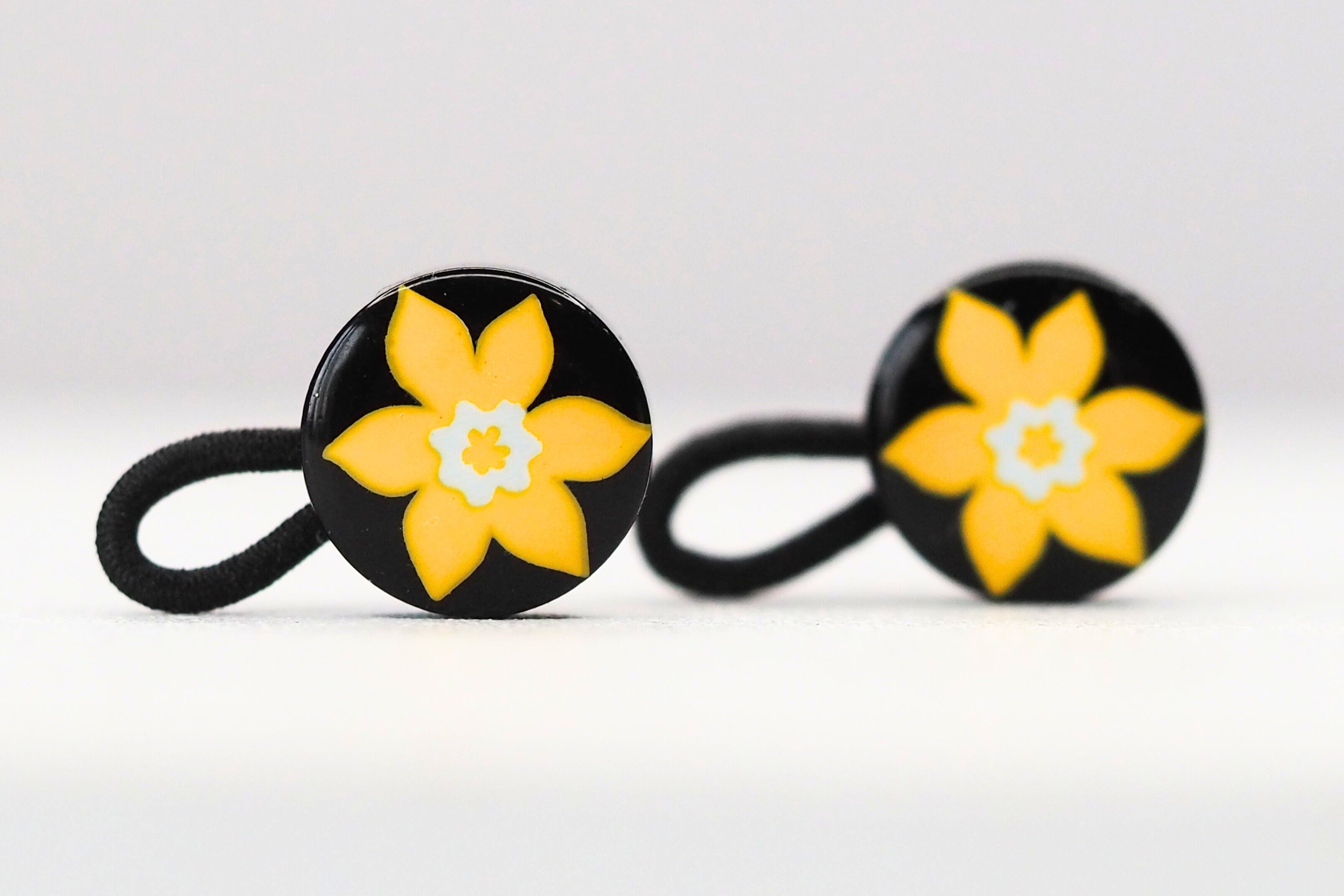 Front view of COCHIC and Canadian Cancer Society - 2 Daffodil Cuff Extenders