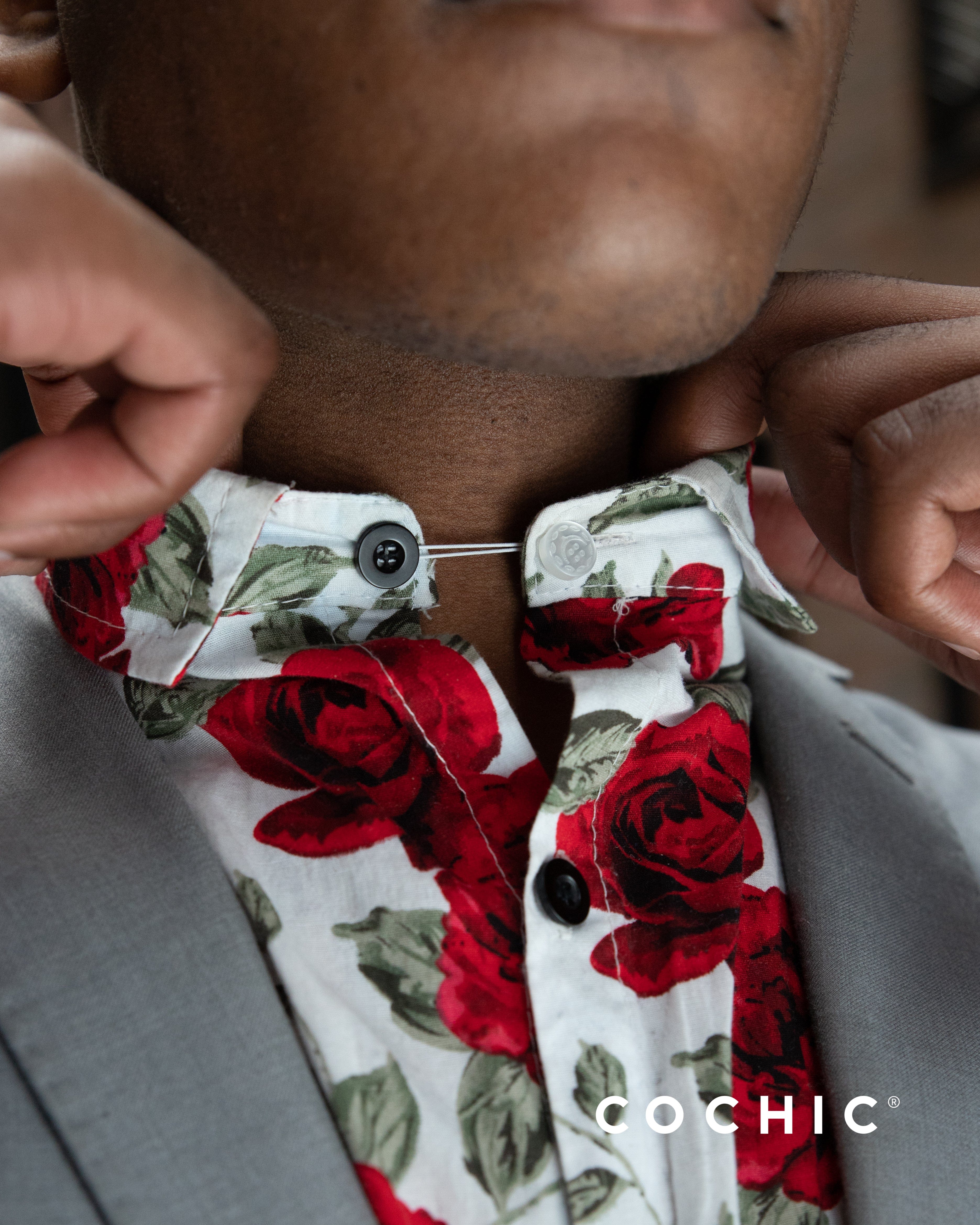 Front picture of man using and stretching the shirt collar extender of 16L and 18L