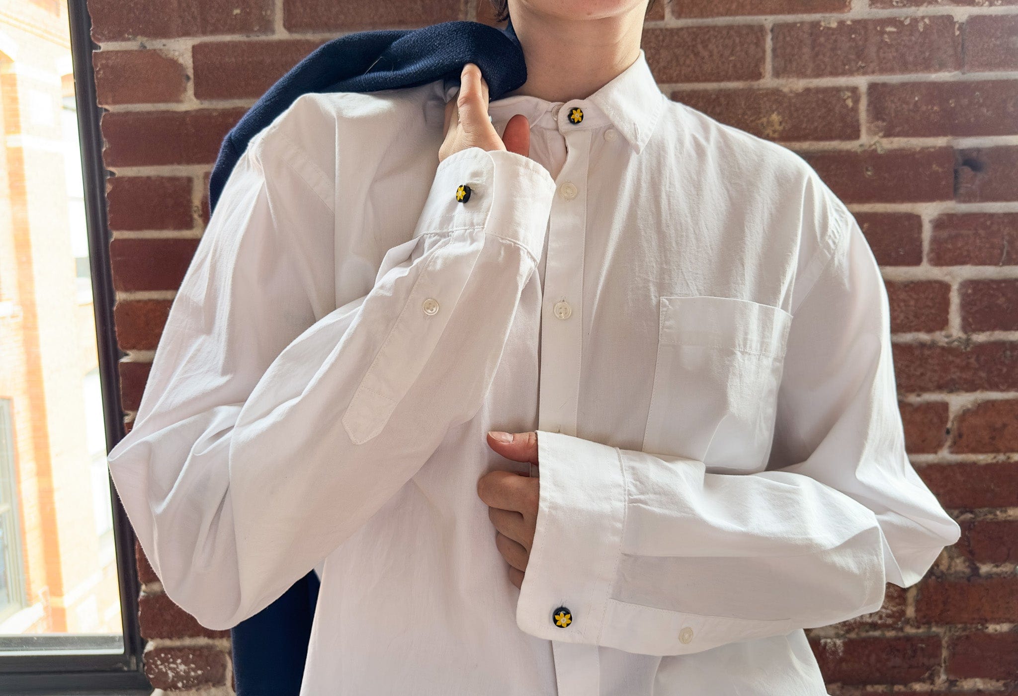 Model wearing the COCHIC and Canadian Cancer Society - 2 Daffodil Cuff Extenders