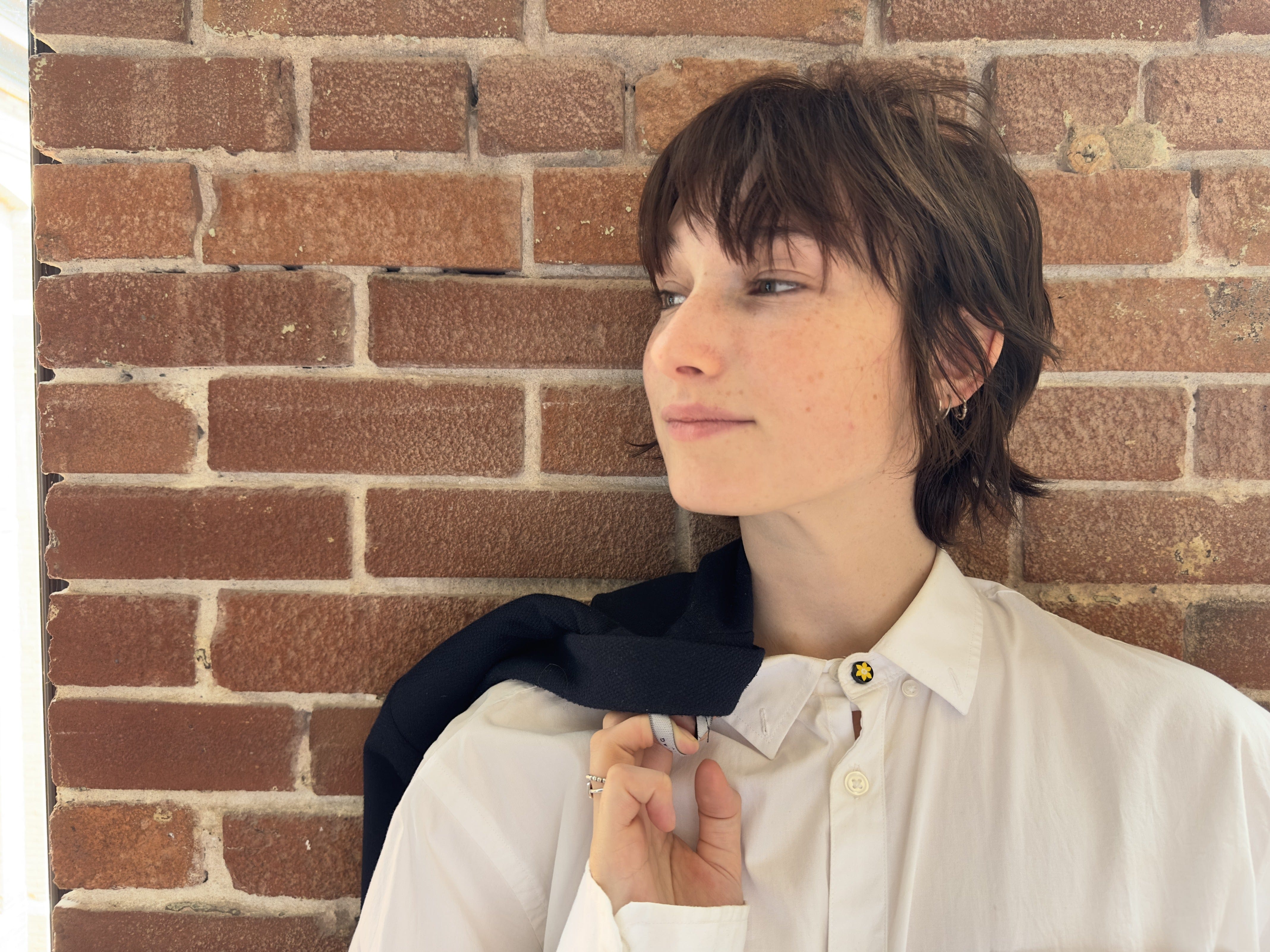 Front View of model wearing COCHIC and Canadian Cancer Society's Daffodil Shirt Collar Extender