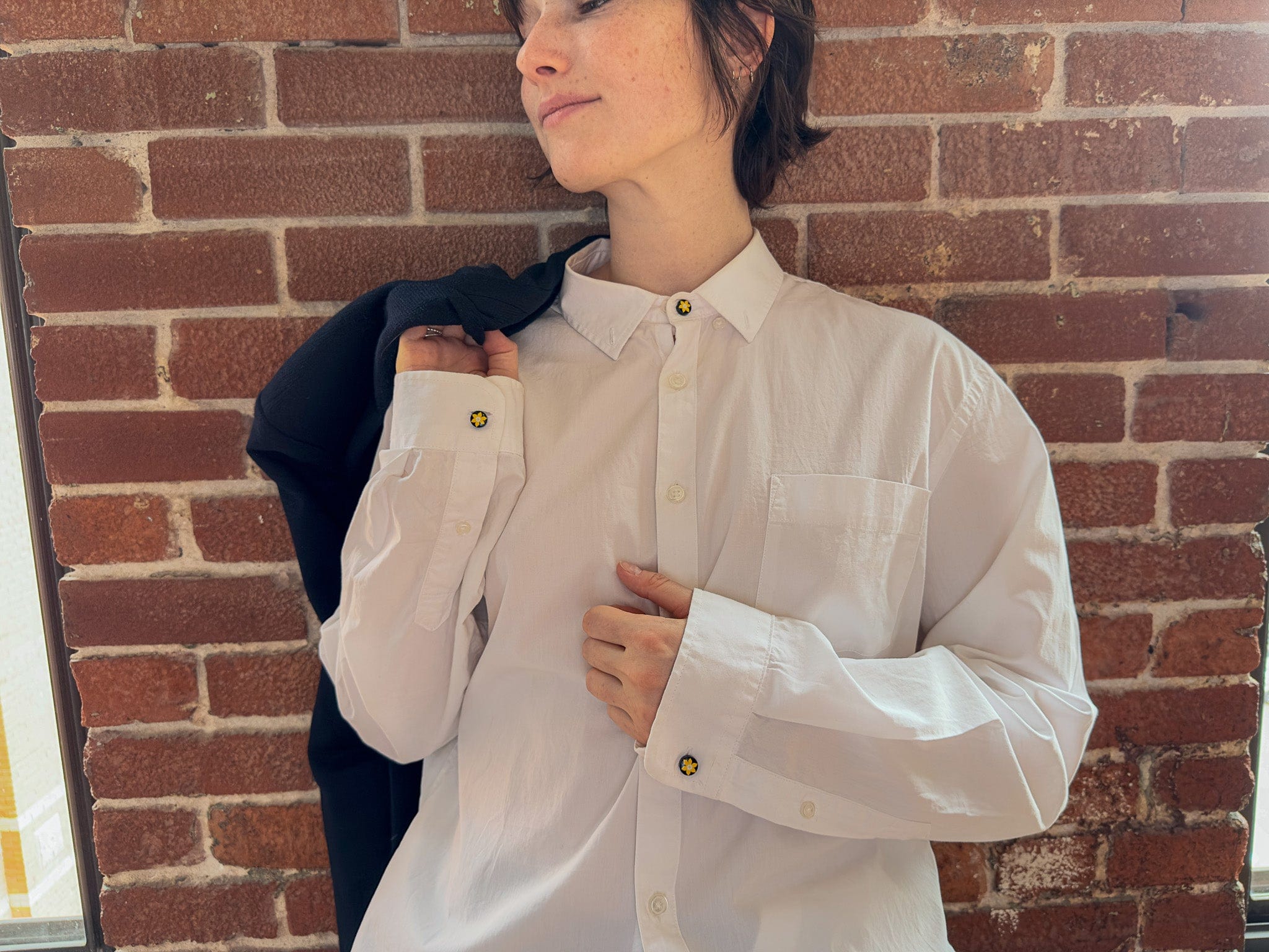 Front view of Model wearing the Cochic Canadian Cancer Society Daffodil Shirt Collar and cuff extender