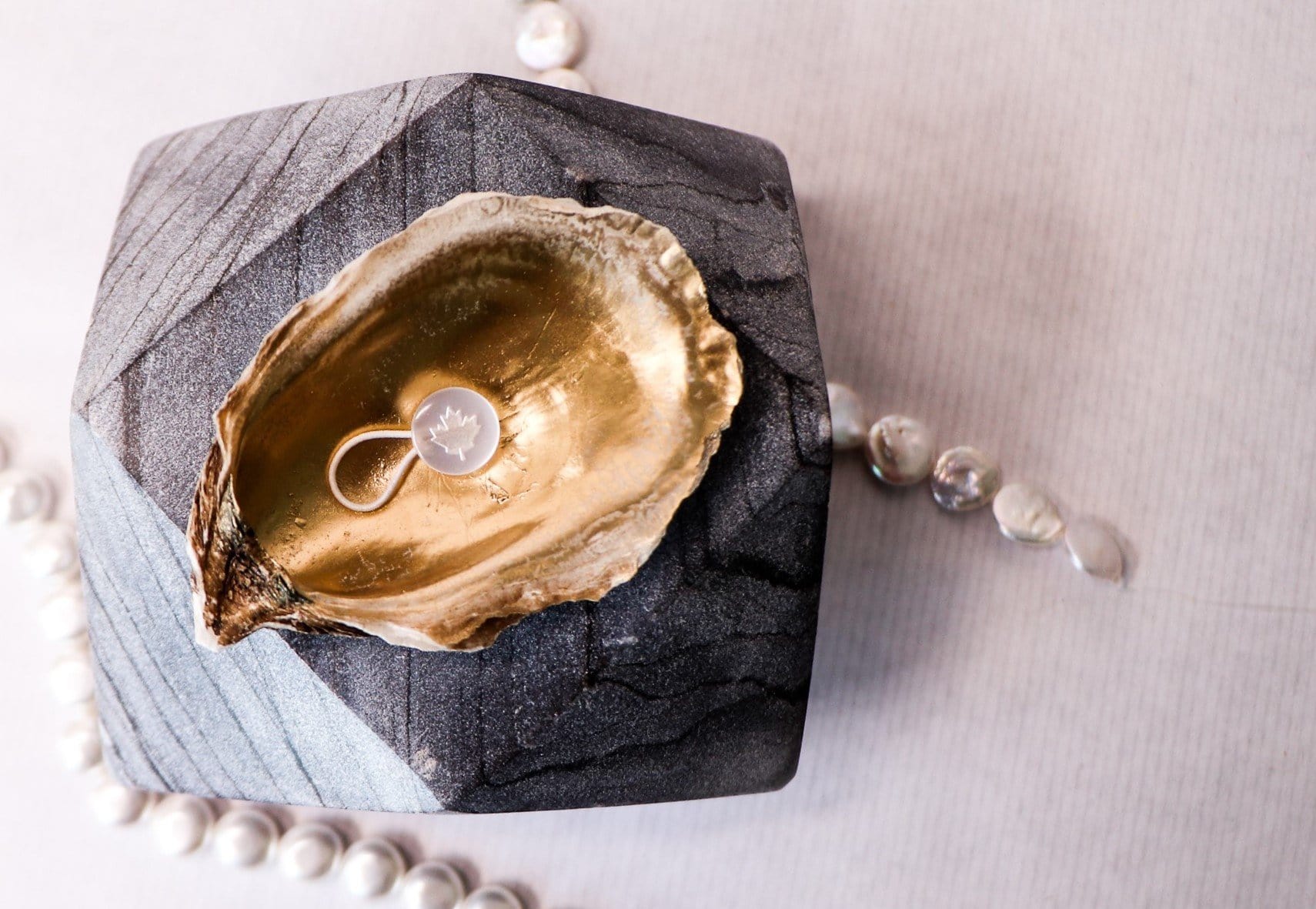 Stylish image of our Canadian Maple Leaf Edition Collar Extender in a clam shell.
