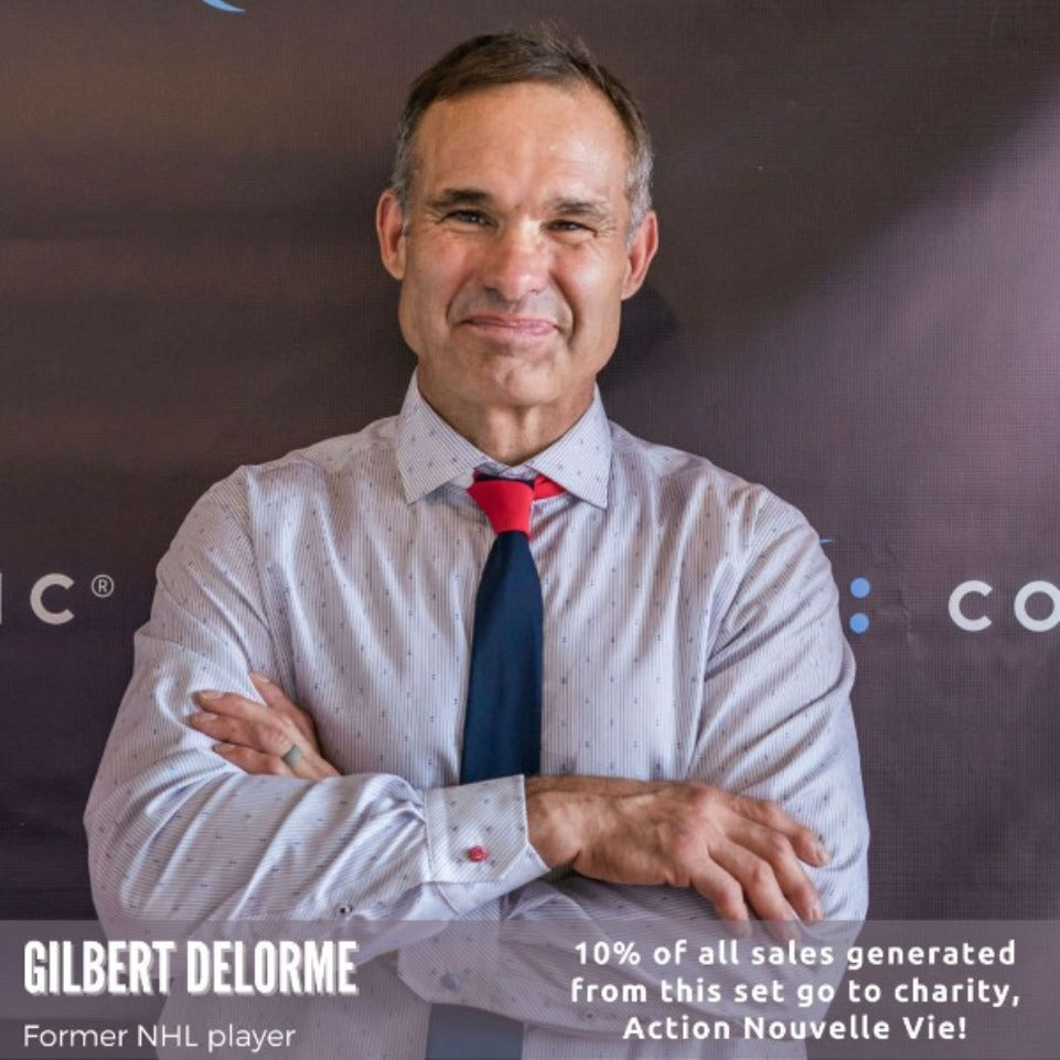 Gilbert delorme wearing red and blue cuff extender