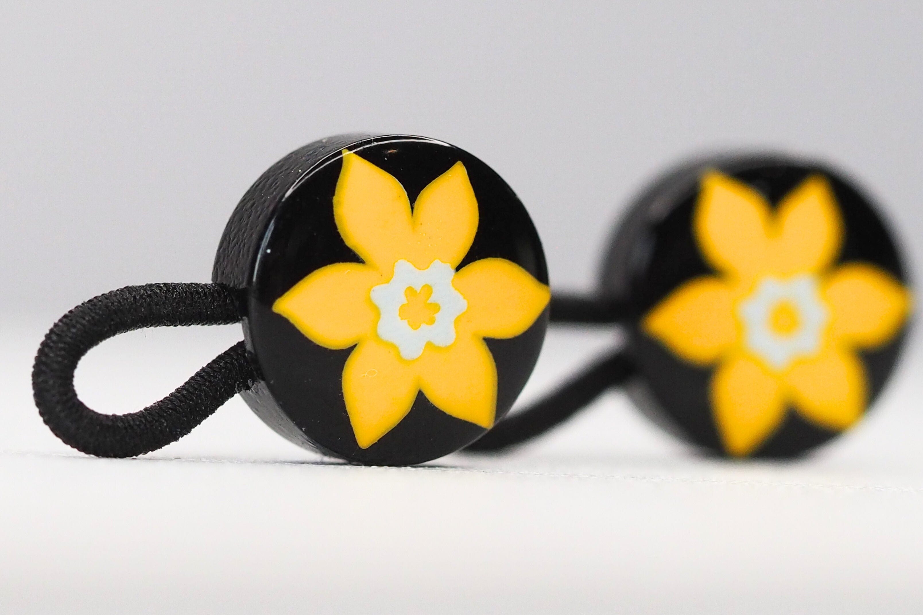Front view of COCHIC and Canadian Cancer Society - 2 Daffodil Cuff Extenders