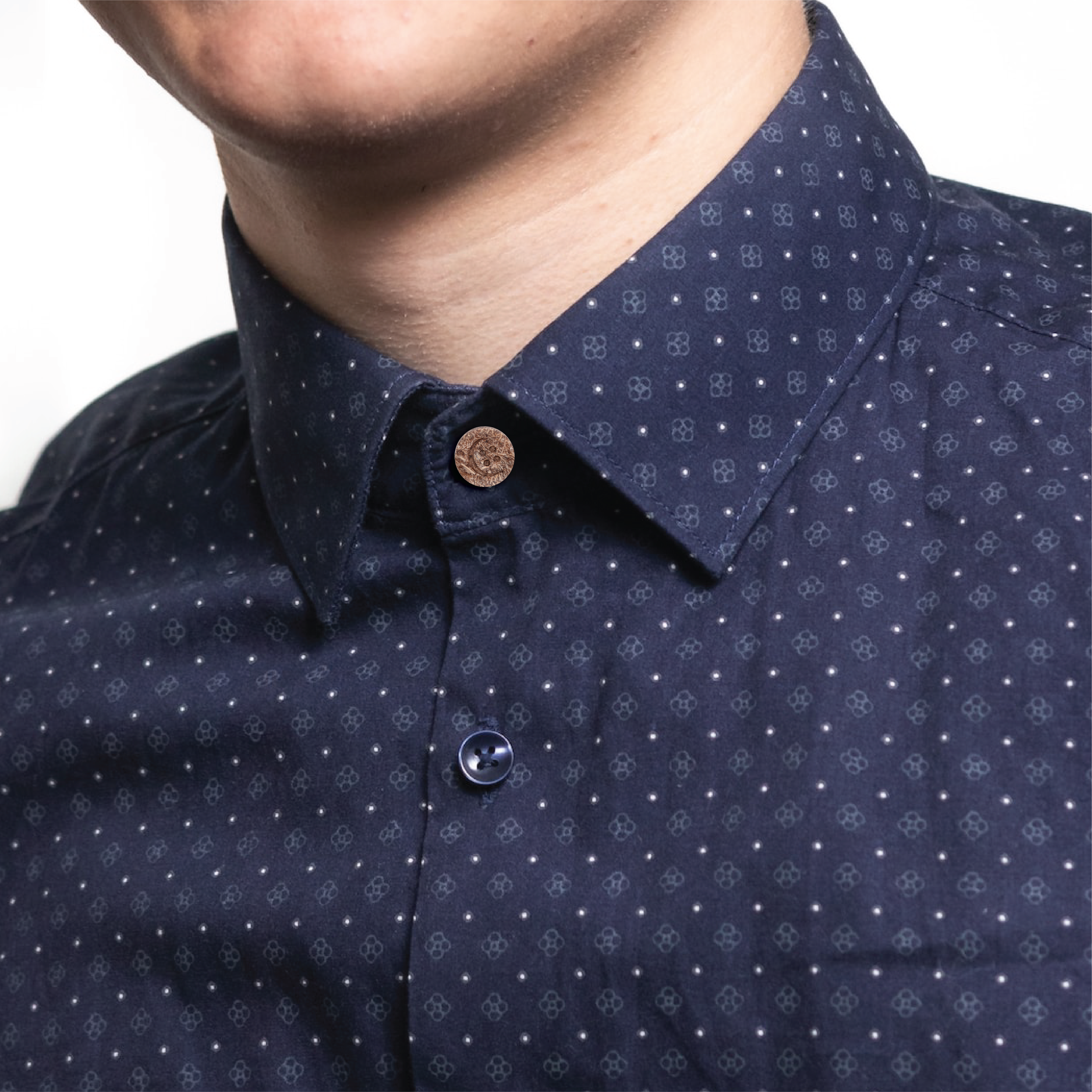 Front picture of a man wearing a coconut shirt collar extender