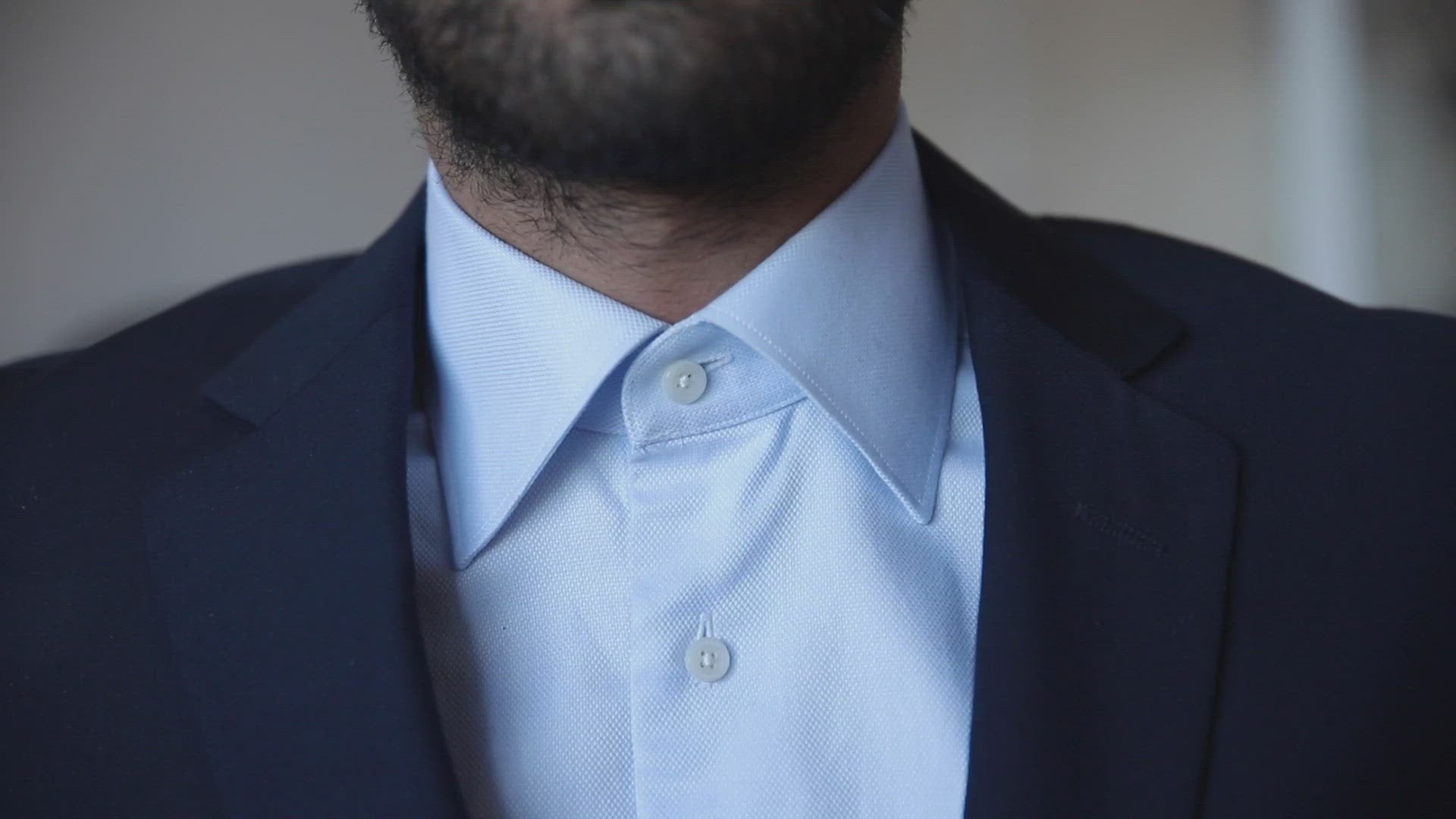 video presentation of how to wear a white canadian shirt collar extender